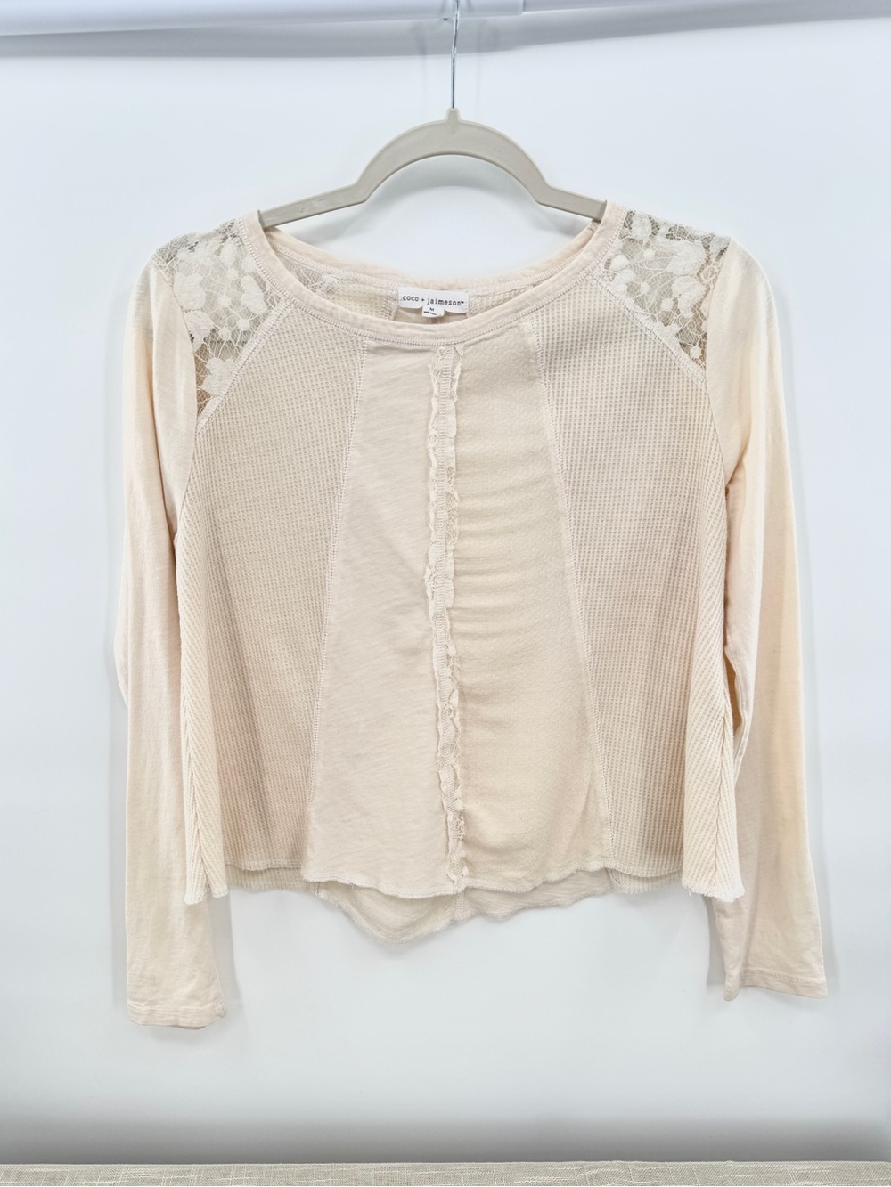 long-sleeve waffle-knit top lace shoulder inlays raw-edge panel